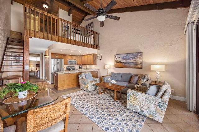 3543 Lower Honoapiilani Rd Unit D-401, Lahaina, HI 96761 - living room featuring light tile patterned flooring, wooden ceiling with exposed beams, a ceiling fan, high vaulted ceiling, and baseboards