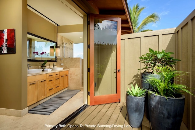 bathroom featuring tile patterned floors and vanity