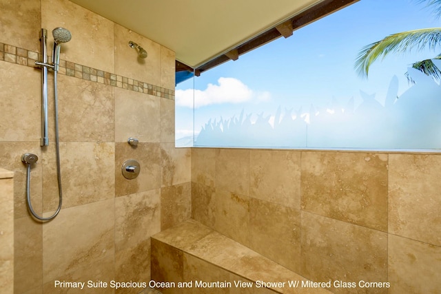 bathroom featuring tiled shower