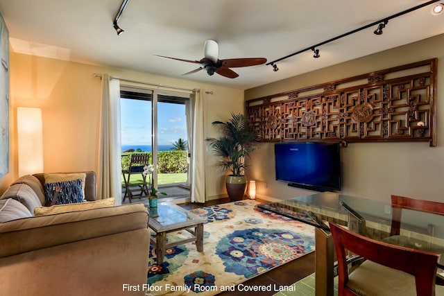 living room with ceiling fan and track lighting