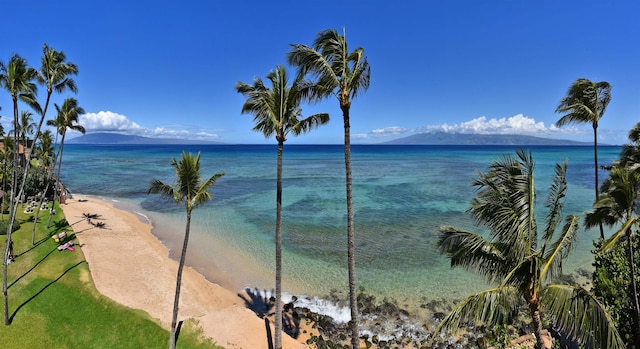 property view of water with a view of the beach and a mountain view