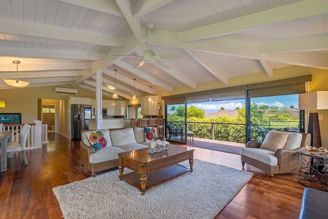 living room featuring a wealth of natural light, dark hardwood / wood-style flooring, a wall mounted air conditioner, and vaulted ceiling with beams