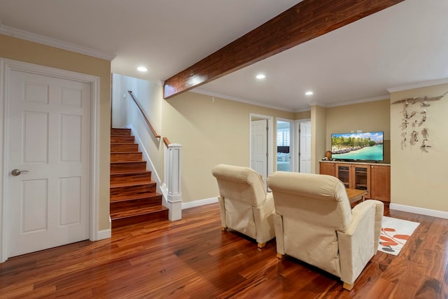 living room with beamed ceiling, hardwood / wood-style floors, and ornamental molding