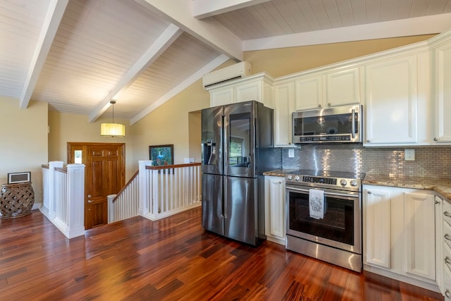 kitchen with light stone countertops, a wall unit AC, decorative backsplash, appliances with stainless steel finishes, and vaulted ceiling with beams