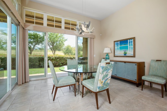 dining area featuring an inviting chandelier