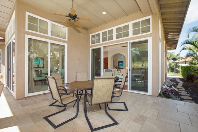 view of patio / terrace with ceiling fan and outdoor dining area