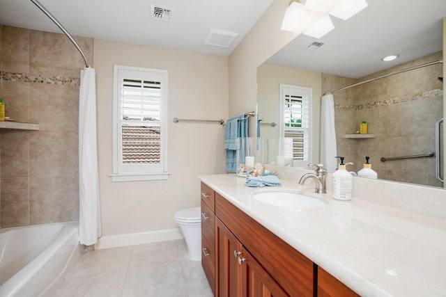 full bath featuring toilet, tile patterned flooring, visible vents, and baseboards