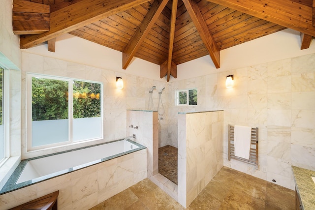 bathroom with tile walls, vaulted ceiling with beams, wooden ceiling, and independent shower and bath