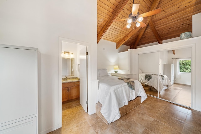 bedroom with sink, wood ceiling, ensuite bath, high vaulted ceiling, and beamed ceiling