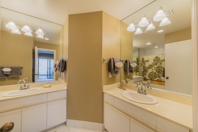 bathroom with tile flooring and vanity