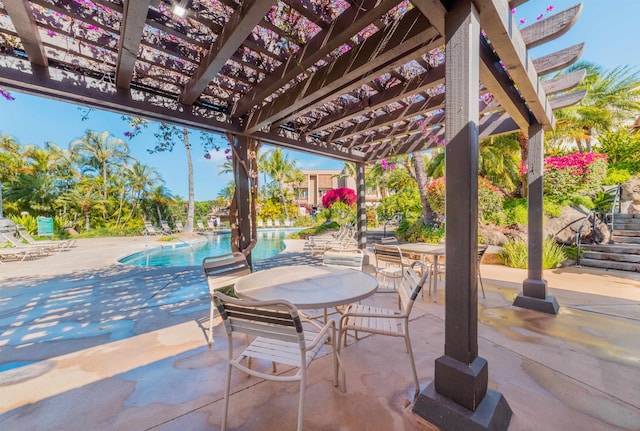 view of terrace featuring a pergola