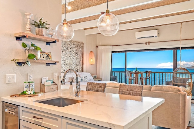 kitchen featuring a wall mounted air conditioner, dishwasher, white cabinetry, a water view, and light stone countertops