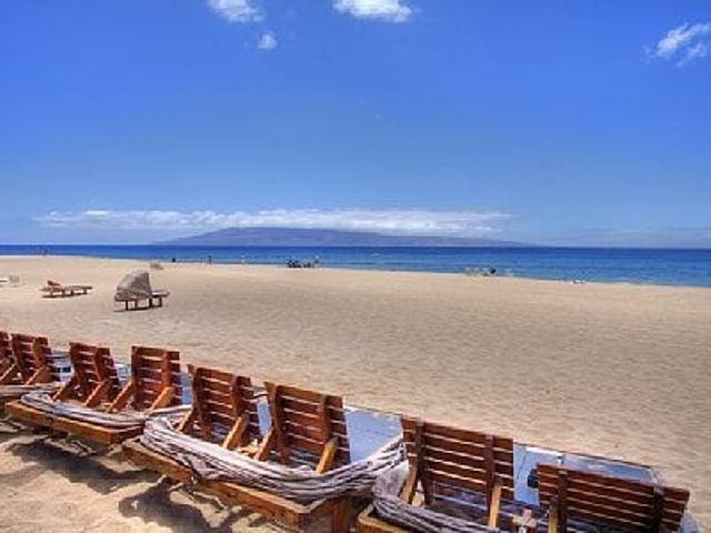 view of water feature with a beach view