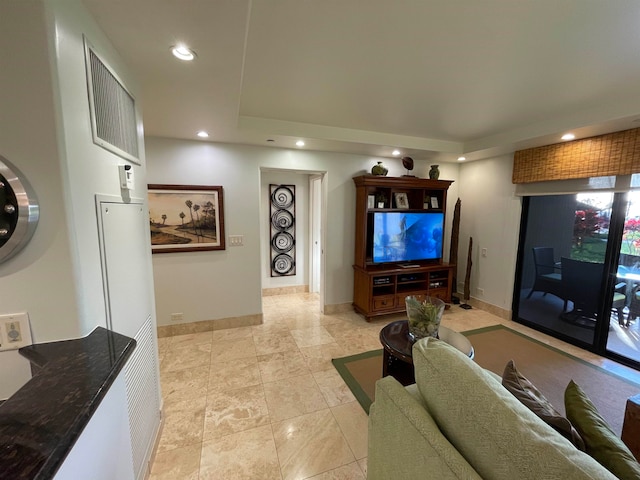 living room featuring light tile patterned floors