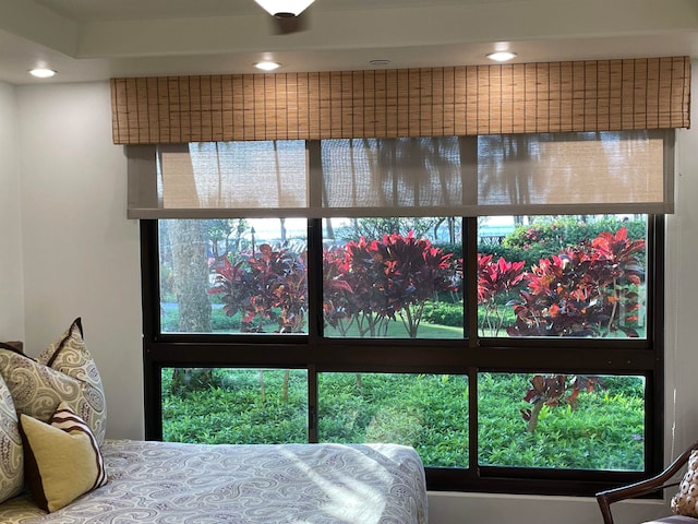 bedroom featuring multiple windows