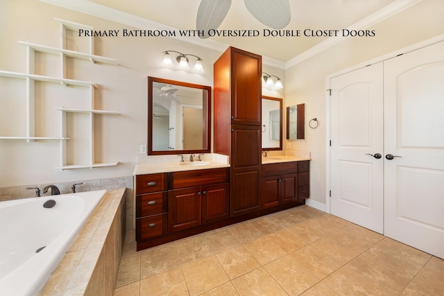 bathroom featuring ceiling fan, tile patterned flooring, a relaxing tiled tub, vanity, and ornamental molding