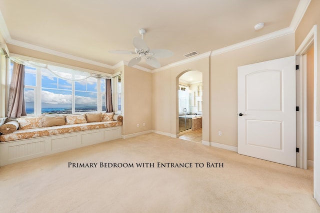 interior space with light carpet, ceiling fan, and crown molding