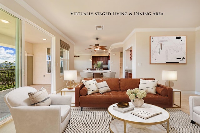 carpeted living room with ceiling fan and crown molding