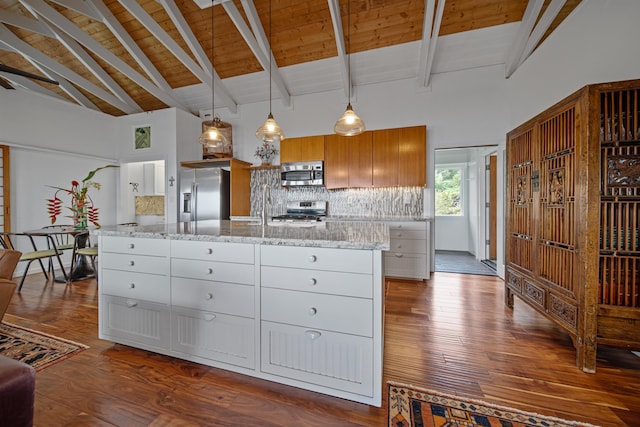 kitchen featuring white cabinetry, light stone countertops, stainless steel appliances, backsplash, and wood ceiling