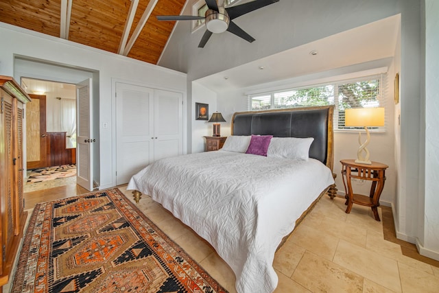 tiled bedroom with wooden ceiling, lofted ceiling with beams, and ceiling fan