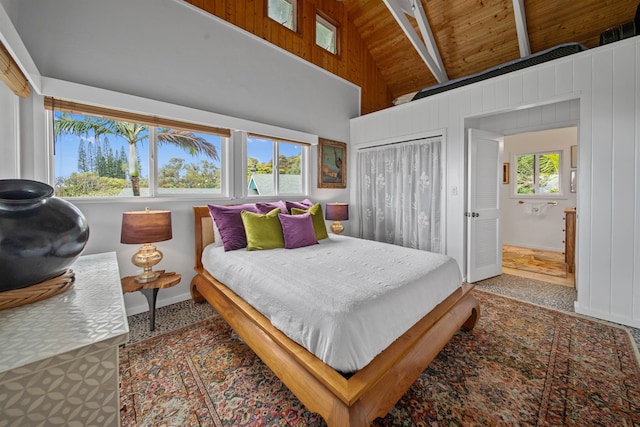 bedroom with high vaulted ceiling, wooden ceiling, and beam ceiling