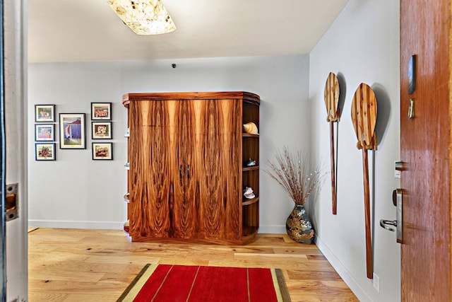 foyer with light wood-type flooring