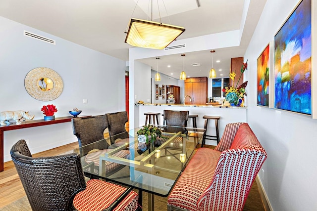 dining area featuring light hardwood / wood-style flooring