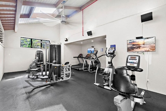 workout area featuring lofted ceiling