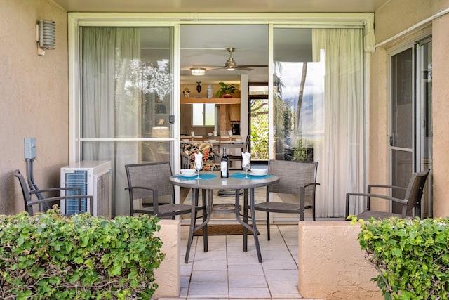 exterior space featuring ceiling fan