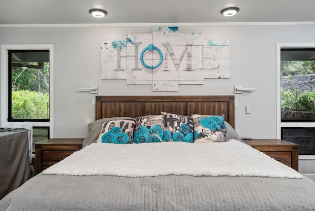 bedroom featuring ornamental molding