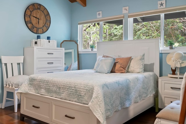 bedroom featuring dark wood finished floors