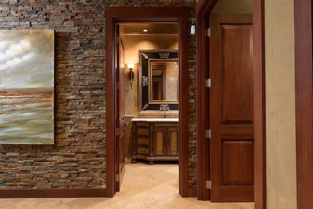 hall featuring light tile patterned floors