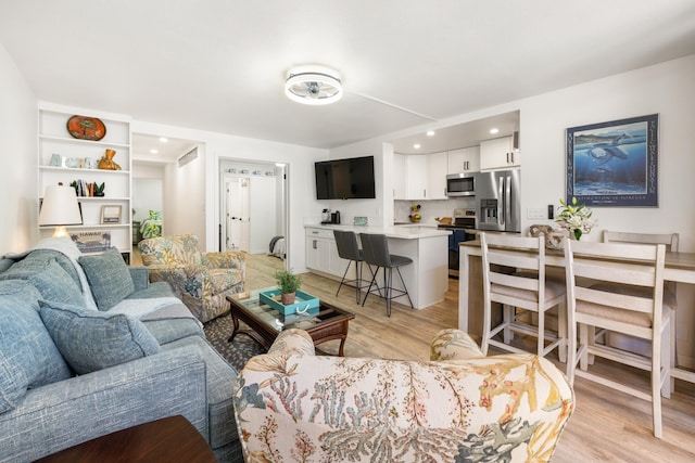 living room featuring light hardwood / wood-style flooring