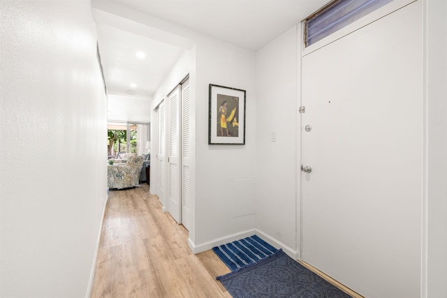 corridor featuring light wood-type flooring