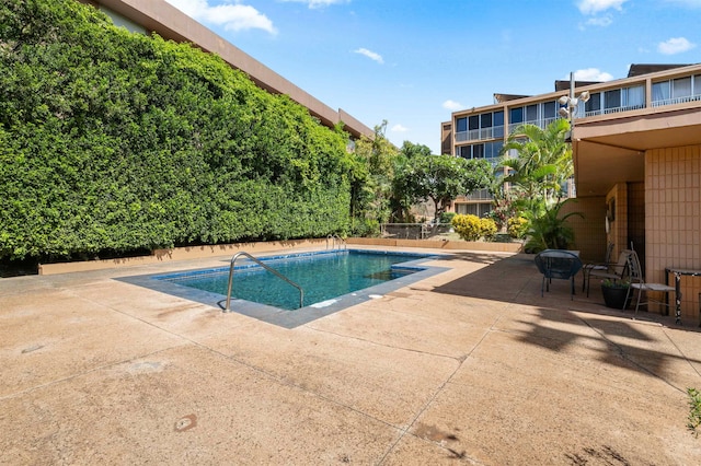 view of pool with a patio