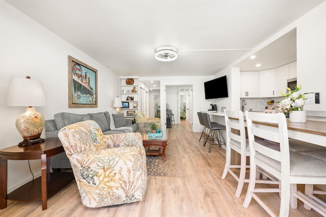 living room with light wood-type flooring