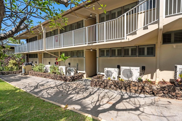 view of building exterior with ac unit