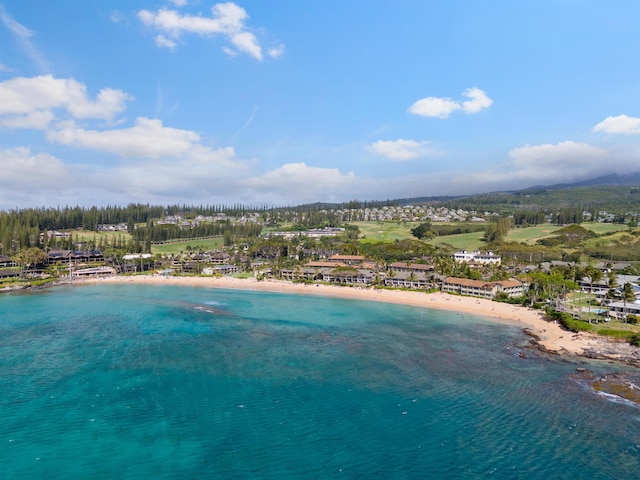 birds eye view of property featuring a view of the beach and a water view