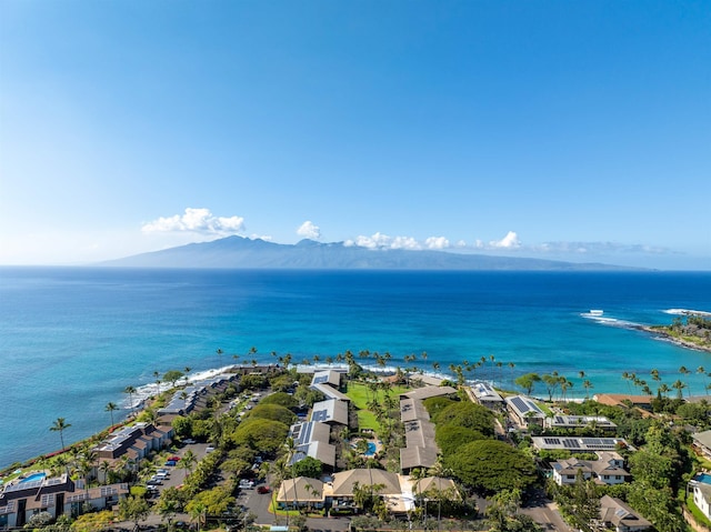 birds eye view of property featuring a residential view and a water and mountain view