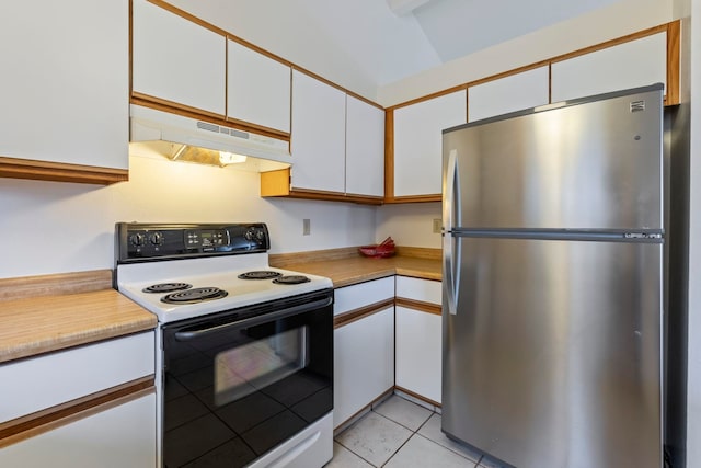 kitchen with light tile patterned floors, electric range oven, white cabinets, and stainless steel fridge