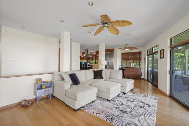 563 Mikioi Pl, Kihei, HI 96753 - living area featuring light wood finished floors, a ceiling fan, and recessed lighting