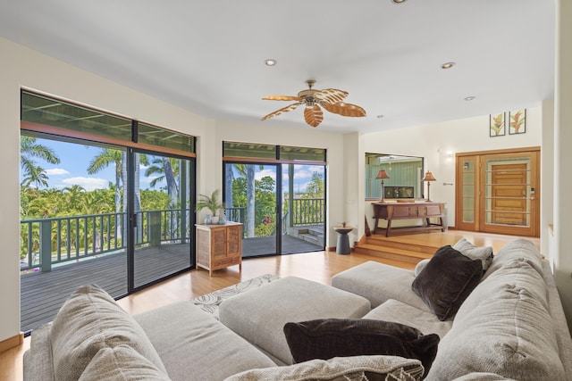 563 Mikioi Pl, Kihei, HI 96753 - living area with plenty of natural light, wood finished floors, and recessed lighting