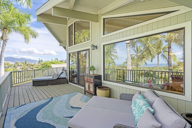 563 Mikioi Pl, Kihei, HI 96753 - wooden deck with a mountain view and outdoor lounge area