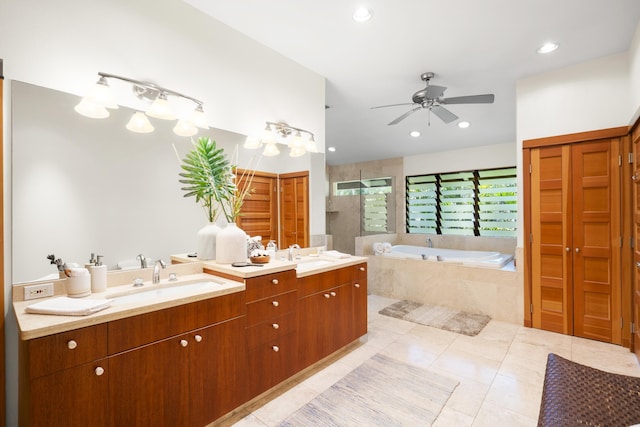 563 Mikioi Pl, Kihei, HI 96753 - bathroom with double vanity, a garden tub, ceiling fan, recessed lighting, and tile patterned flooring