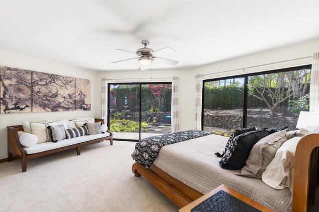 563 Mikioi Pl, Kihei, HI 96753 - bedroom featuring access to exterior, carpet, and a ceiling fan