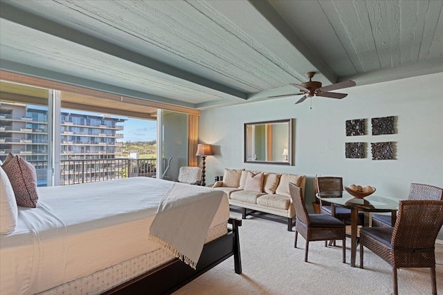 bedroom featuring beam ceiling, carpet floors, access to outside, and ceiling fan