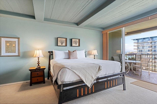 bedroom featuring beam ceiling, wood ceiling, and light colored carpet