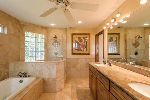 bathroom featuring double vanity, separate shower and tub, ceiling fan, tile walls, and tile floors