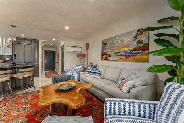 12 S Kihei Rd Unit E2, Kihei, HI 96753 - living area with a wall mounted air conditioner and recessed lighting