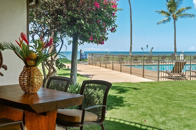 12 S Kihei Rd Unit E2, Kihei, HI 96753 - view of property's community featuring a pool, a patio area, and a water view